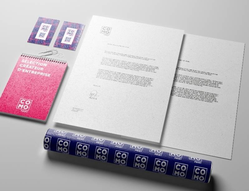 Kit papeterie professionnelle imprimée : cartes, bloc-notes, en-têtes.